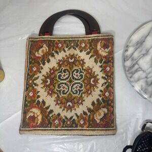 Vintage needlepoint floral tapestry handbag with dark handles